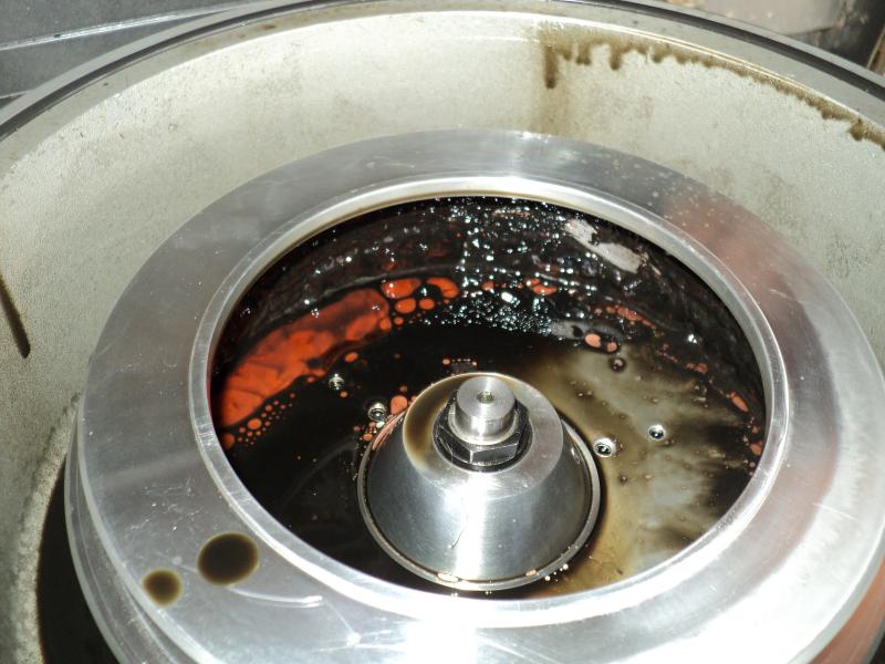 Centrifuge with motor oil